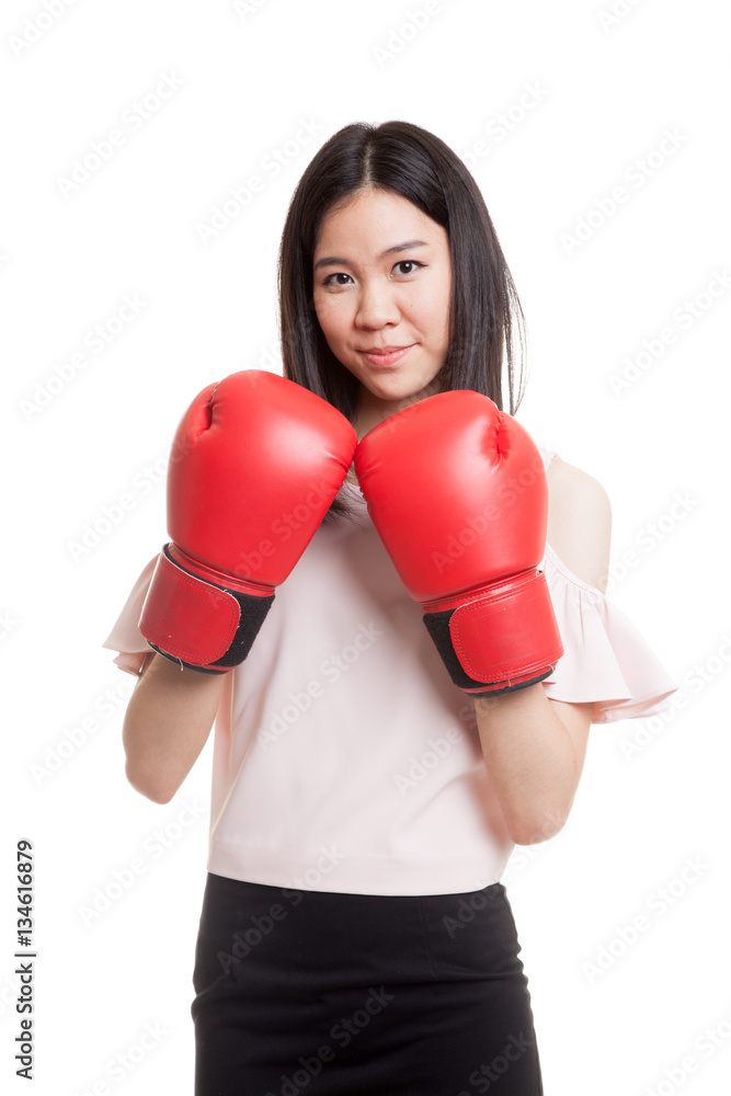 Young Asian business woman with red boxing gloves. Young Asian business woman with red boxing gloves.