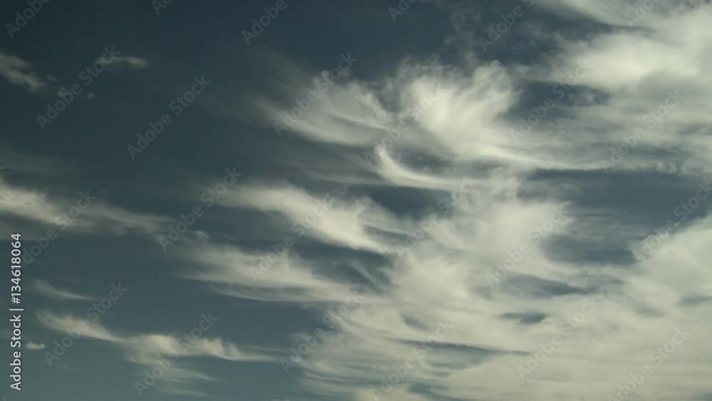 Cirrus Uncinus Clouds with Falling Ice Crystals Cirrus Uncinus Clouds with Falling Ice Crystals