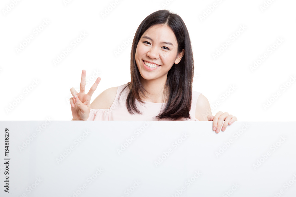 Young Asian woman show victory sign with blank sign. Young Asian woman show victory sign with blank sign.