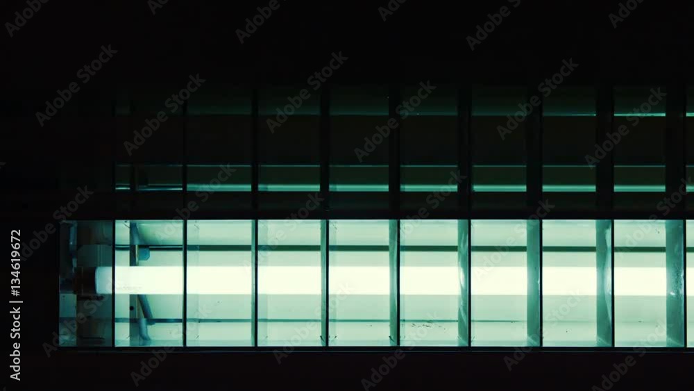 Fluorescent neon light tubes flickering when switching on and off StockVideo Adobe Stock