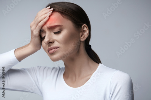Woman Pain. Girl Having Strong Headache, Suffering From Migraine photo