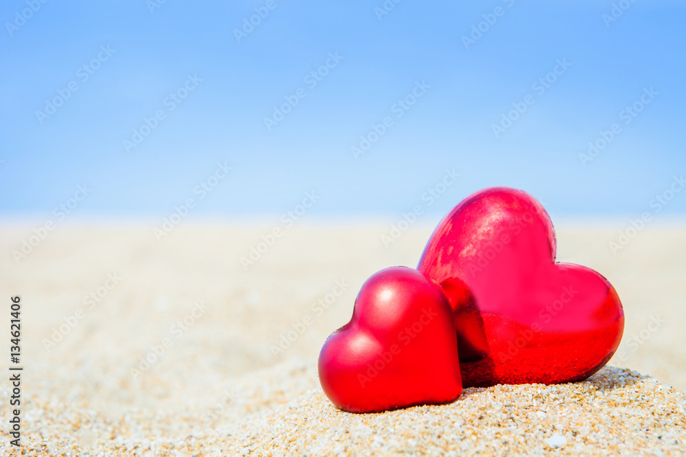 Sweet two heart on sand beach blue sky abstract background love Sweet two heart on sand beach blue sky abstract background love