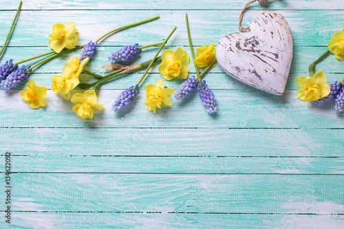 Border from flowers and decorative heart photo