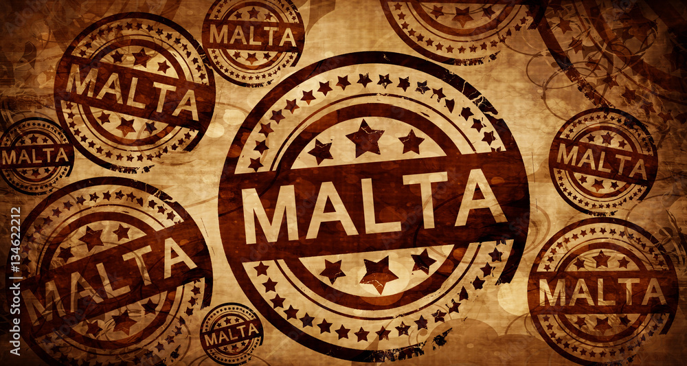 Malta, vintage stamp on paper background