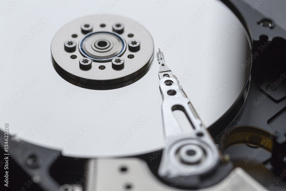 Close ups of an open computer hard drive Close ups of an open computer hard drive
