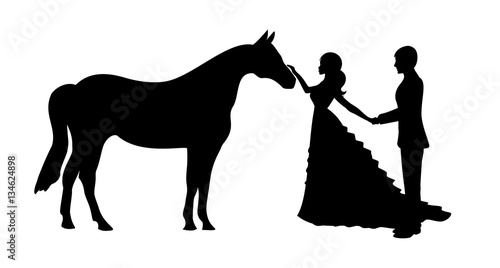 Bride and groom with horse