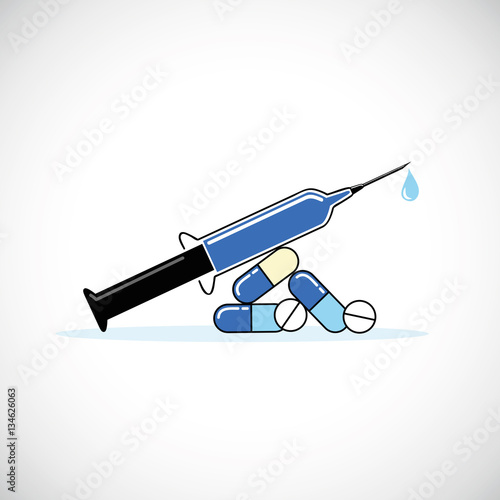 blaue spritze und tabletten