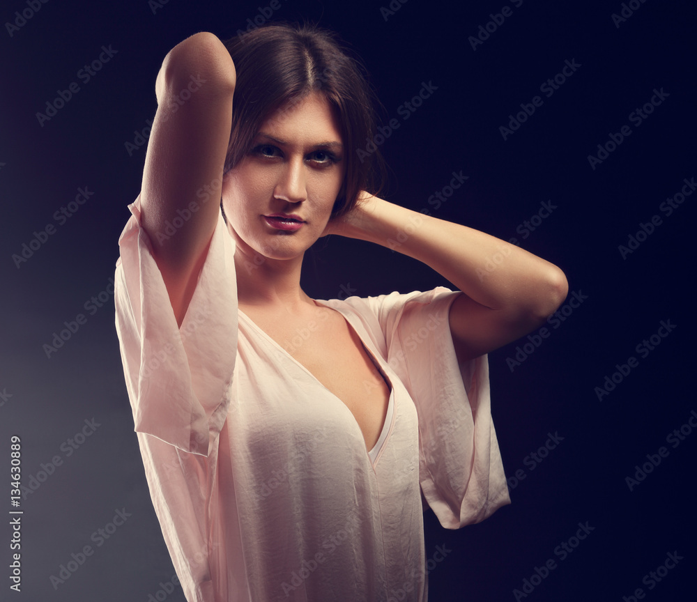 Sexy female model posing in pink blouse with long hair style on Sexy female model posing in pink blouse with long hair style on