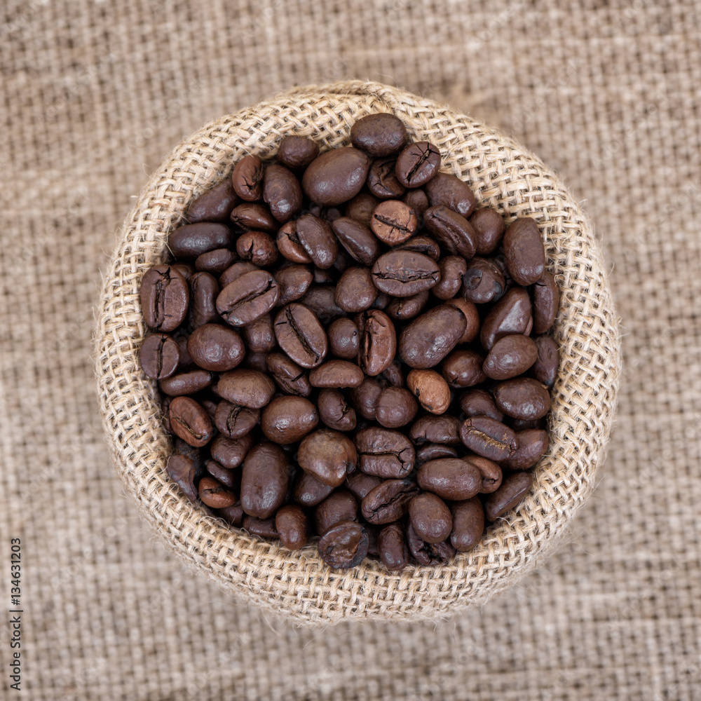 Coffee beans in burlap. Top view.