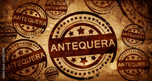 Antequera, vintage stamp on paper background