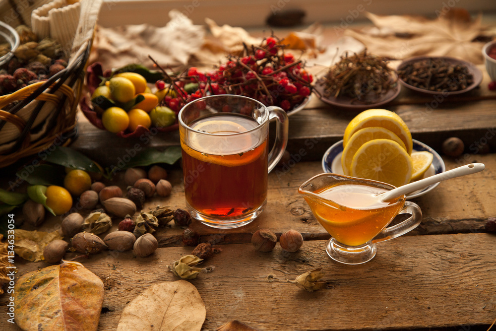 Hot tea with lemon and honey, good treat to have vitamins and strong immunity. Hot tea with lemon and honey, good treat to have vitamins and strong immunity.