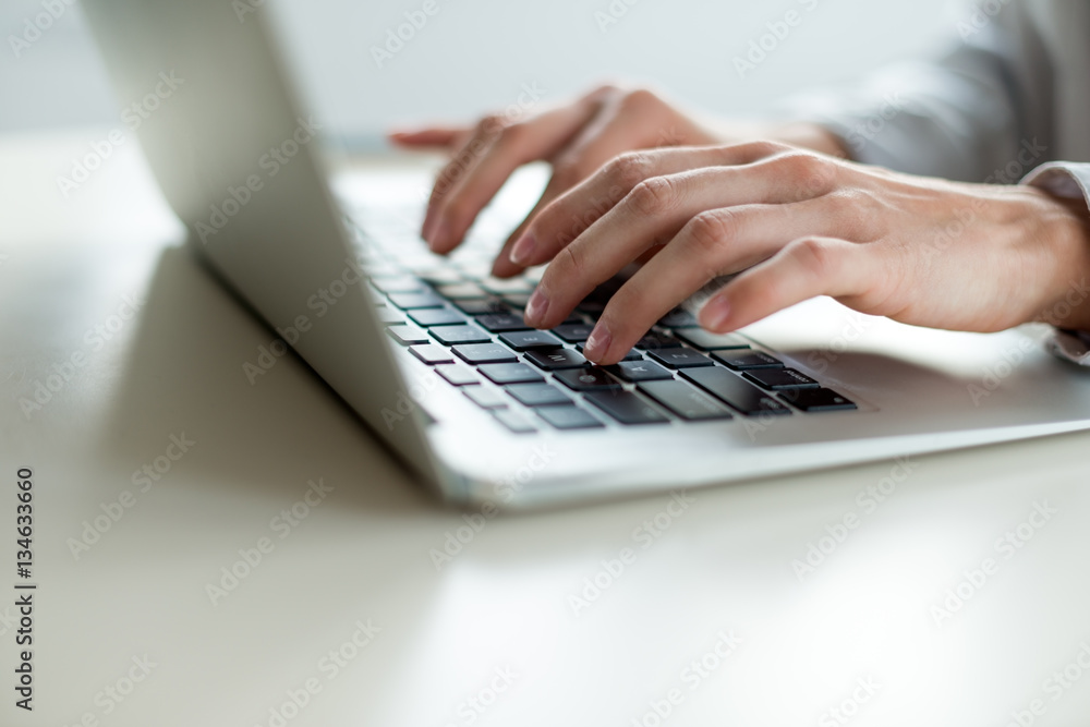 Typing on laptop Typing on laptop