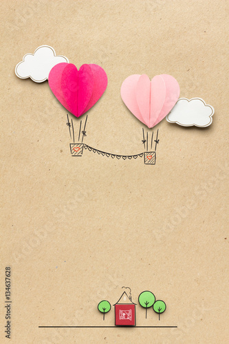 Fly to the sky / Creative valentines concept photo of clouds and hearts as aerostats on brown background. photo