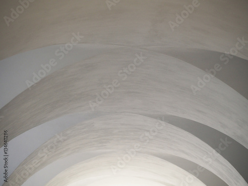 classical architecture, arched vault ceiling, shades of white, light and shadow © ANGHI