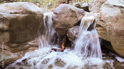 Small Double Waterfall with Three Big Rocks photo