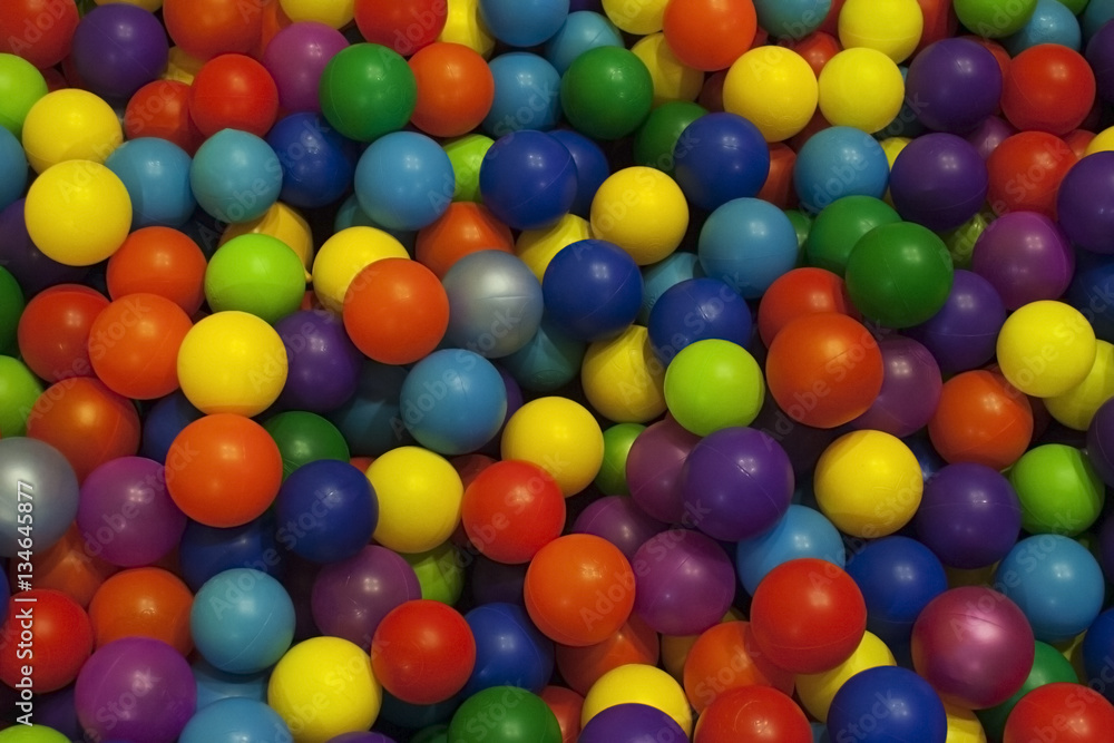 Children's playroom. Bright colored balls of plastic for baby dr Children's playroom. Bright colored balls of plastic for baby dr