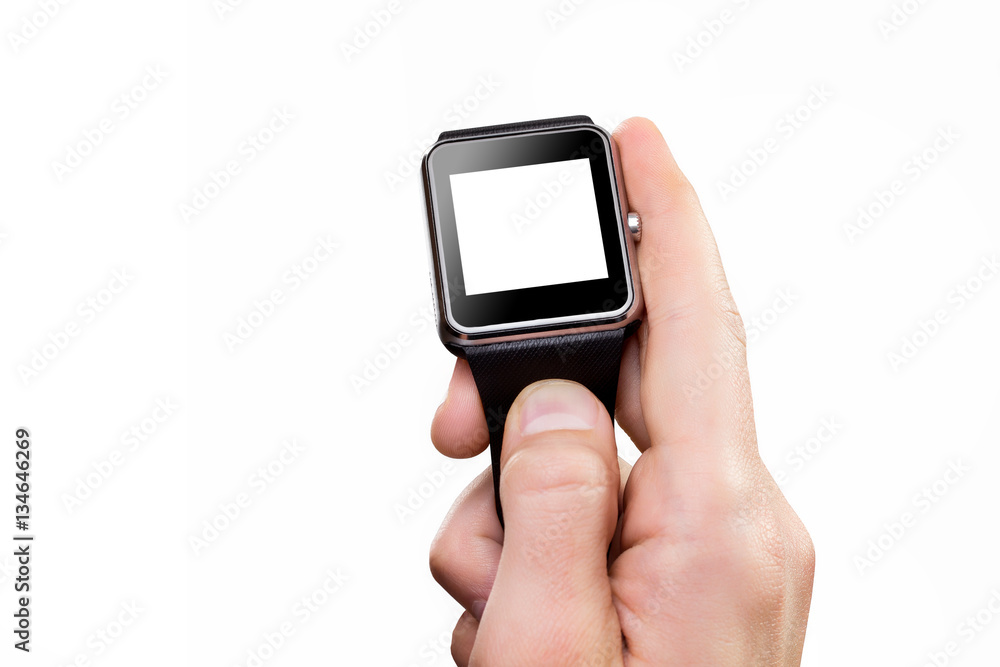Closeup male hand holding smart watch isolated at white Closeup male hand holding smart watch isolated at white