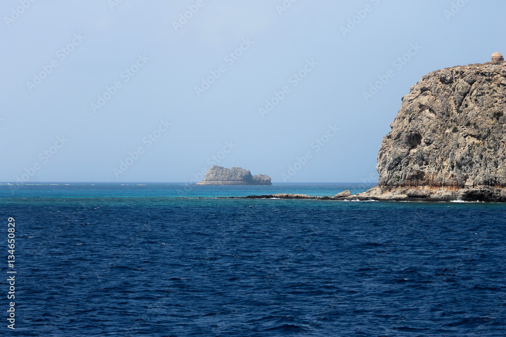 Rocky coast of Greece, picture of the rugged rocky coast of the greek islands