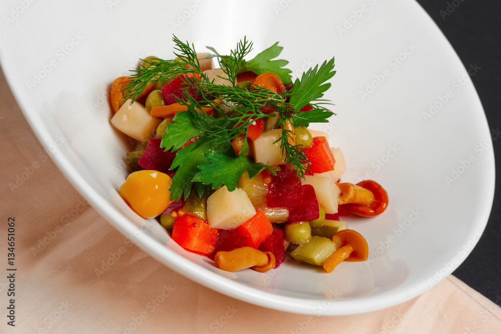 chanterelle salad with peas, tomato and potato