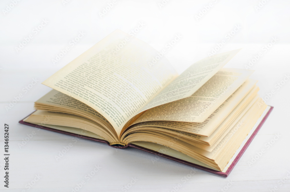 Old book opened on white background Old book opened on white background