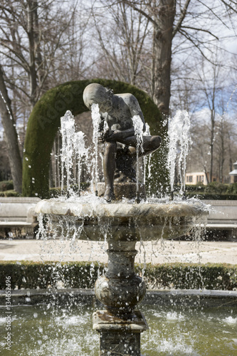 Thorn child in the royal gardens of the aranjuez palace in madri photo