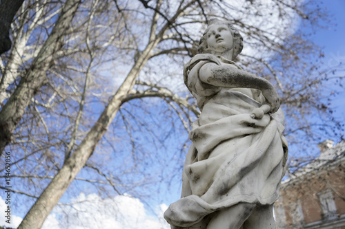 Sculptures of Greek gods in the royal gardens of the palace of a