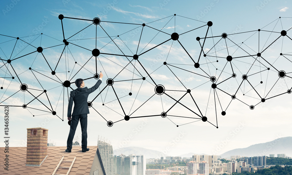 Businessman on house roof presenting networking and connection c Businessman on house roof presenting networking and connection c
