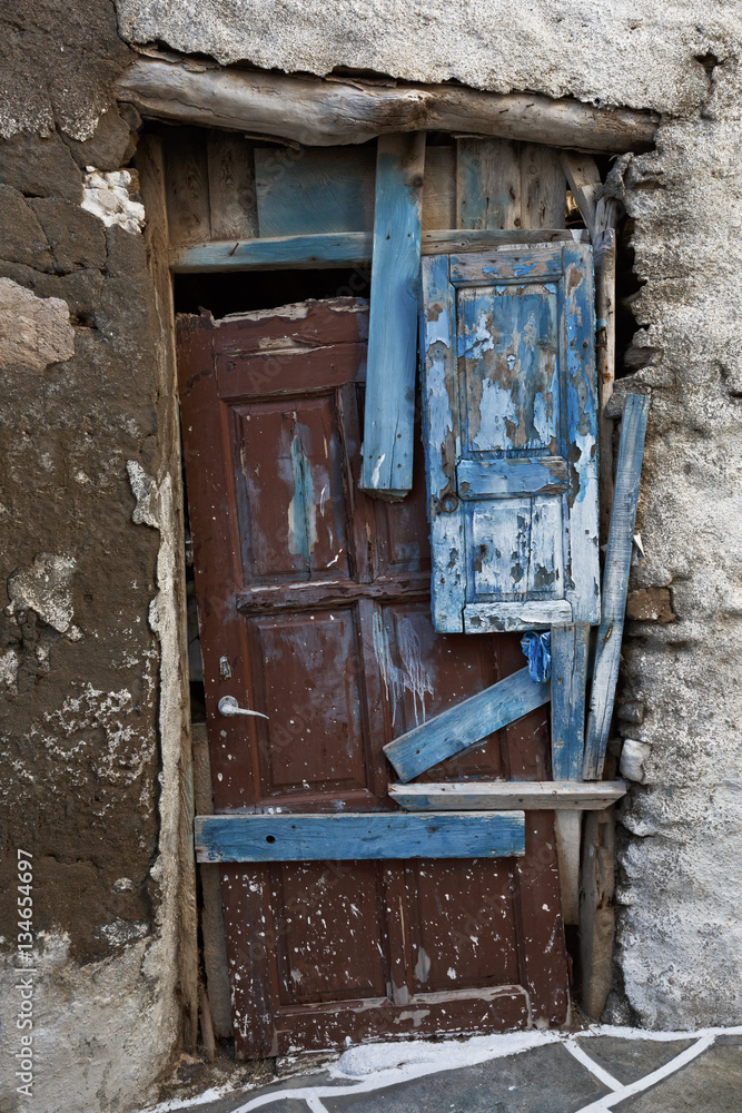 Old door on an old traditional house in the main village of the island.