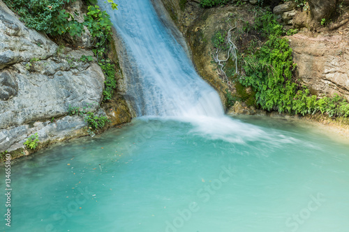 Neda Waterfalls among the rocks and forest  Greece