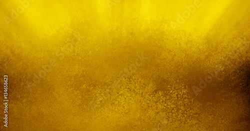 gold sunbeams or streaks of sunshine in the heavens or sky, elegant textured brown gold background design