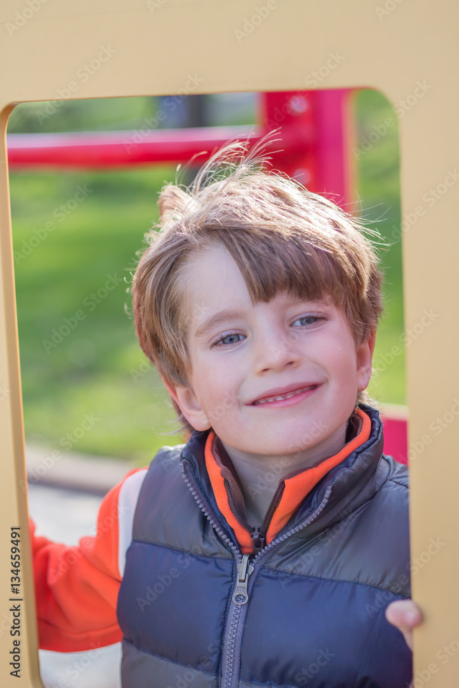Portrait of a boy on playground Portrait of a boy on playground