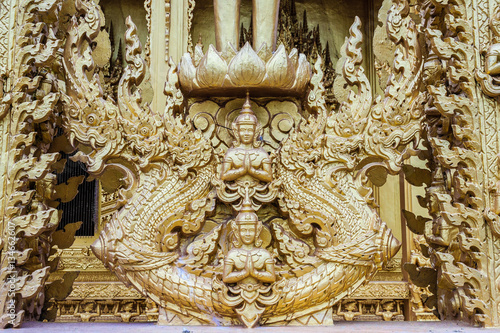 Beautiful and Amazing Golden Buddhist temple  at Wat Paknam Jolo , Bangkla , Chachoengsao , Thailand photo