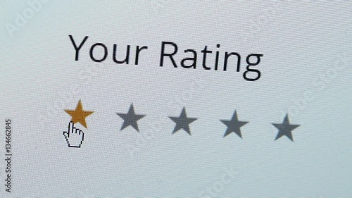 Close up shot of a computer screen with an online rating and review survey feedback poll getting a bad one star review by the customer.