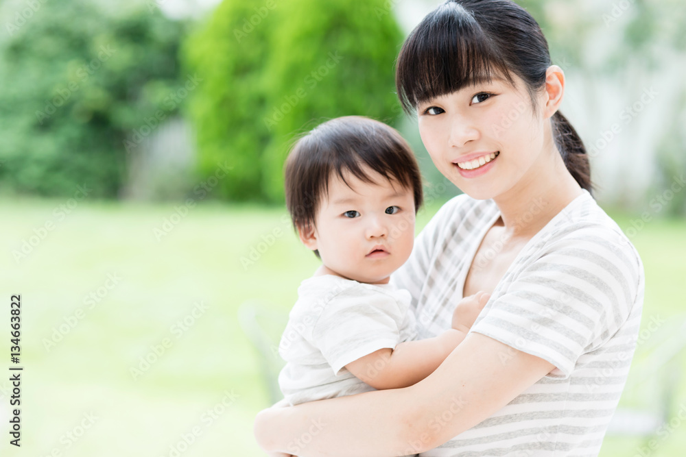 portrait of asian mother and baby in the park portrait of asian mother and baby in the park