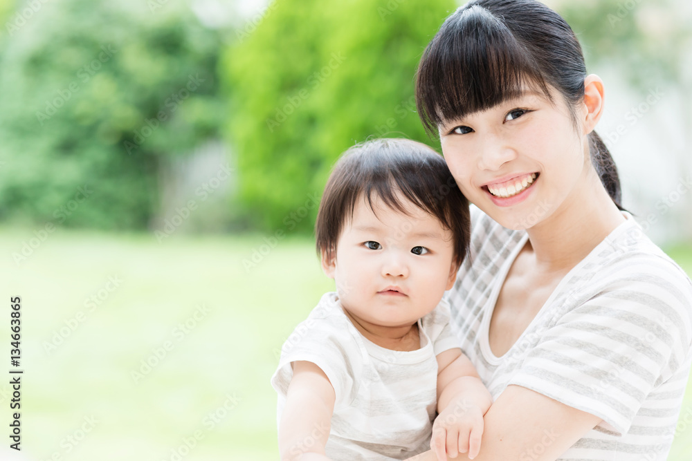 portrait of asian mother and baby in the park portrait of asian mother and baby in the park