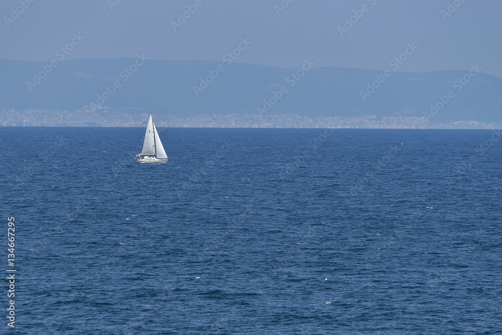 Sailing boat on the high seas