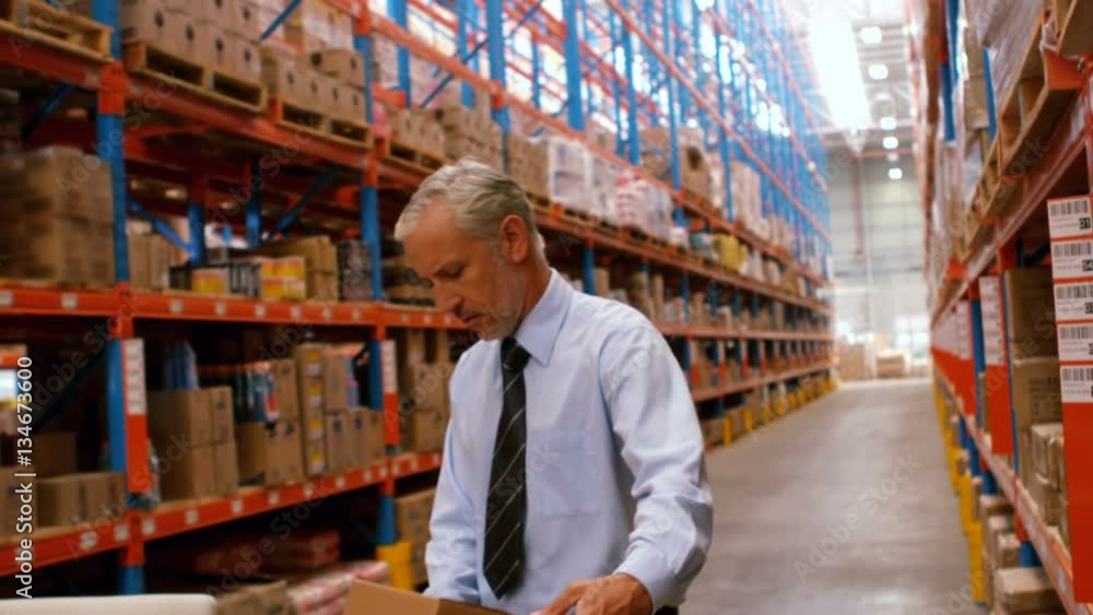 Manager holding cardboard box Manager holding cardboard box
