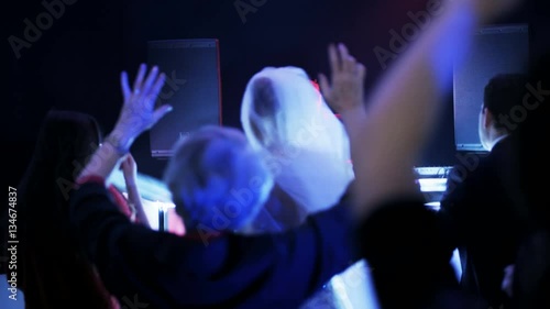 Wedding Guests Dancing in a Nightclub photo