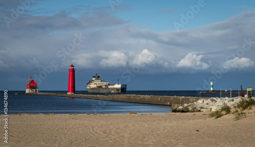 Big ship sailing by the lighthouse © Sandra