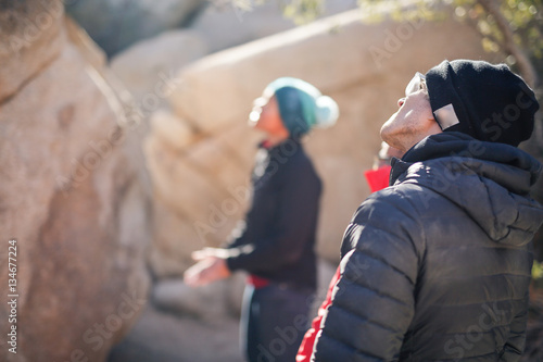 Εκτύπωση καμβά A young african american woman dressed for cold weather prepares to climb on the