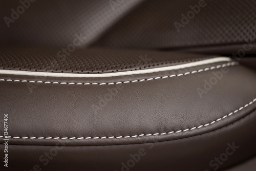 Modern leather car seat detail. Macro photo. photo