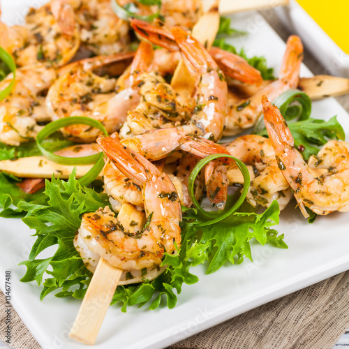 Grilled Shrimp Skewers Appetizer. Selective focus.
