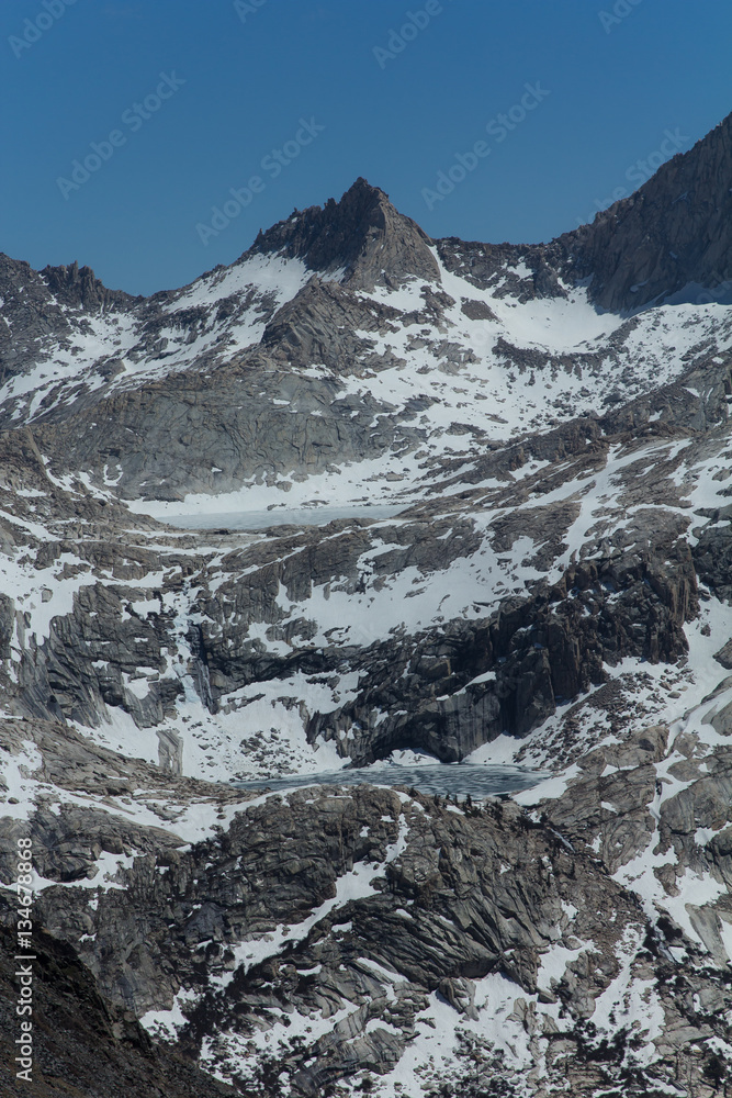 Snow covered granite peaks during spring in California's Sierra Nevada