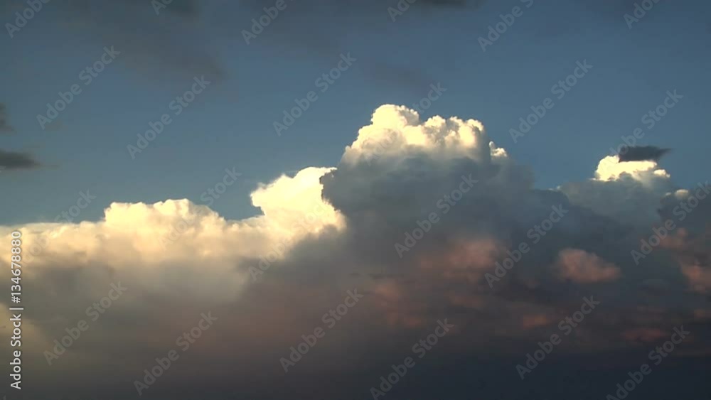 Vigorous Storm Clouds Lit by Setting Sun Vigorous Storm Clouds Lit by Setting Sun