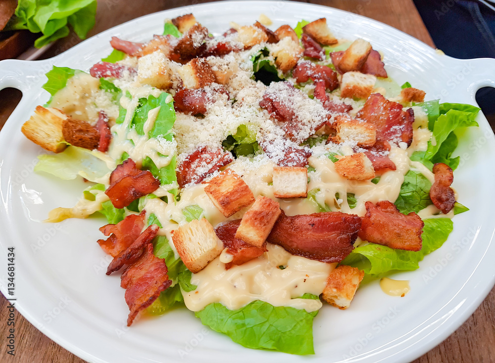 Bacon salad on white dish, selective focus Bacon salad on white dish, selective focus