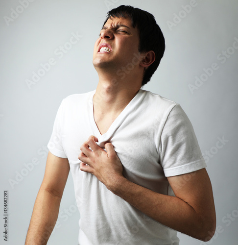 young man having a heart ache photo