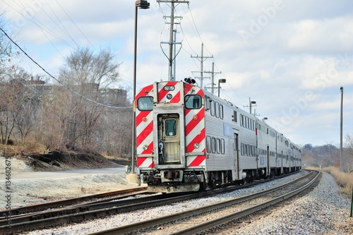 Metra commuter train in Elgin, Illinois on its journey to Chicago about 40 miles away. Metra commects an extensive suburban network with Chicago.