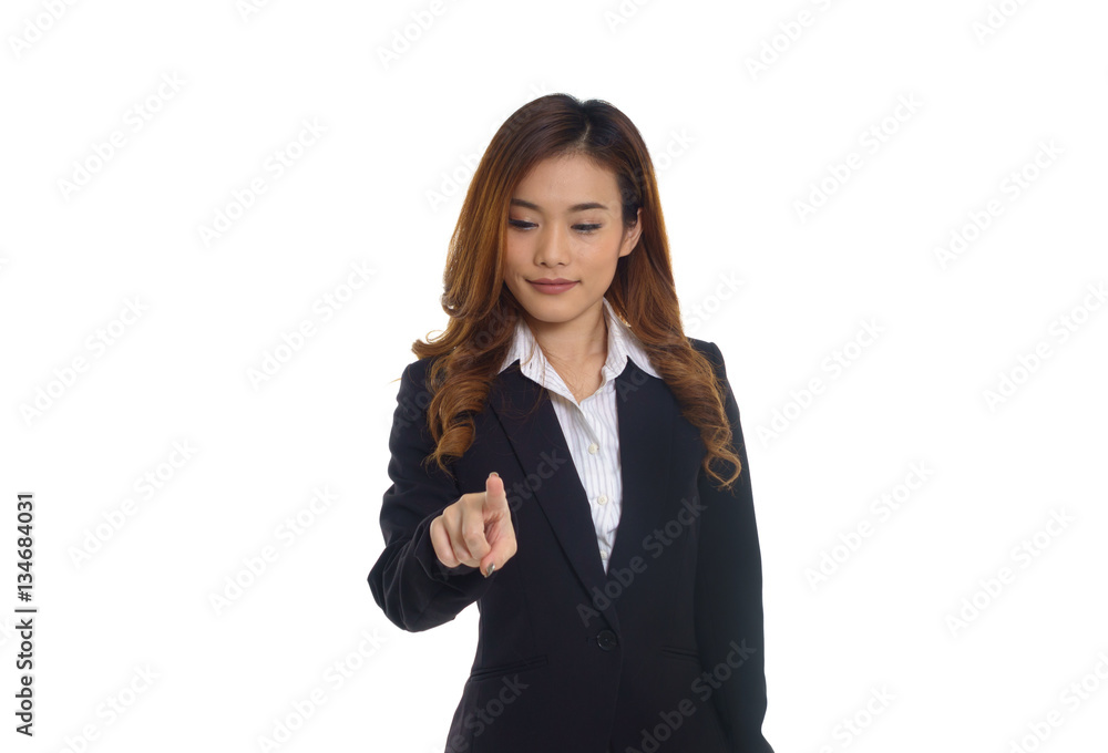 Business woman touching an imaginary screen - isolated over a wh Business woman touching an imaginary screen - isolated over a wh