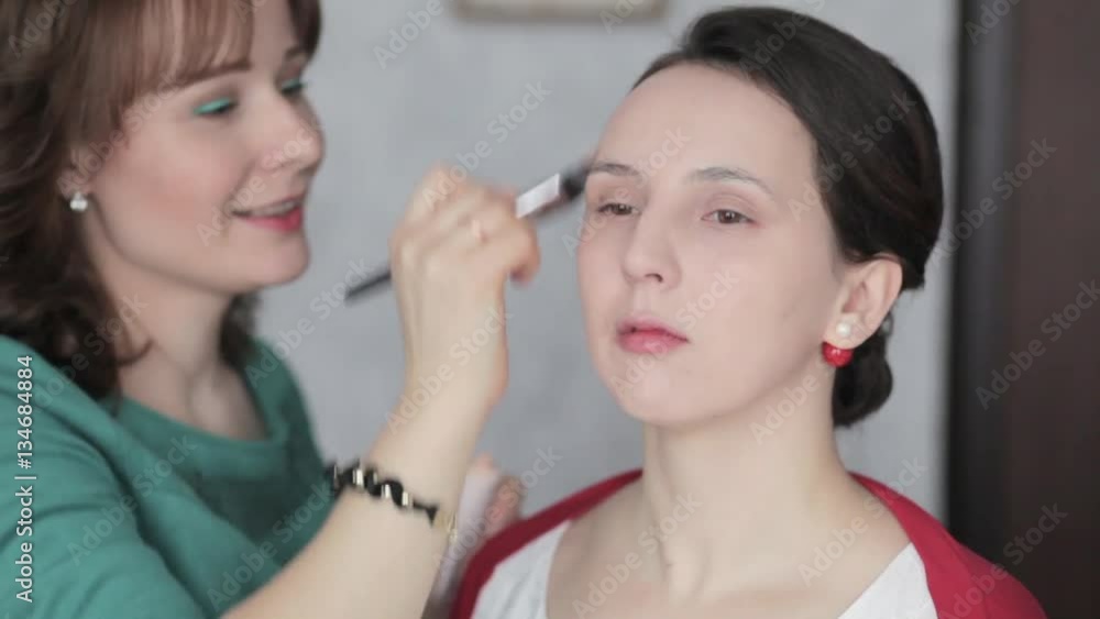 make-up artist working with model make-up artist working with model