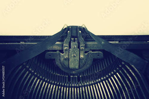 Closeup of an old dirty vintage typewriter, toned instagram effe photo